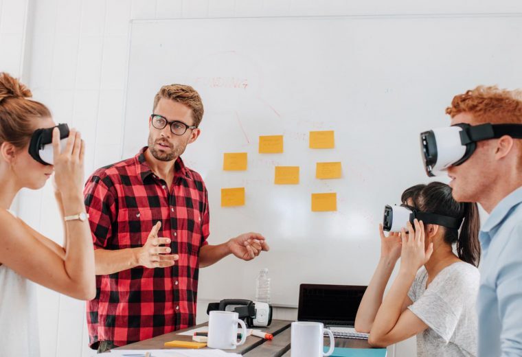 People working on a white board